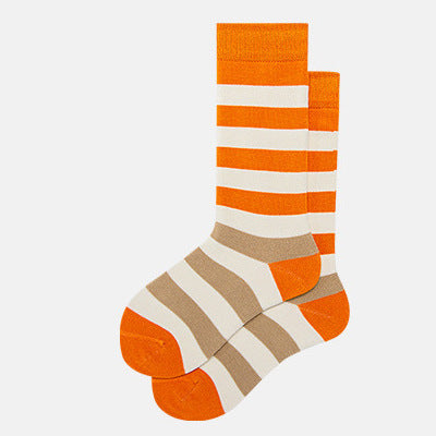 Trendy unisex crew-length socks in vibrant orange with classic white stripes, adding a bold splash of color to any outfit.