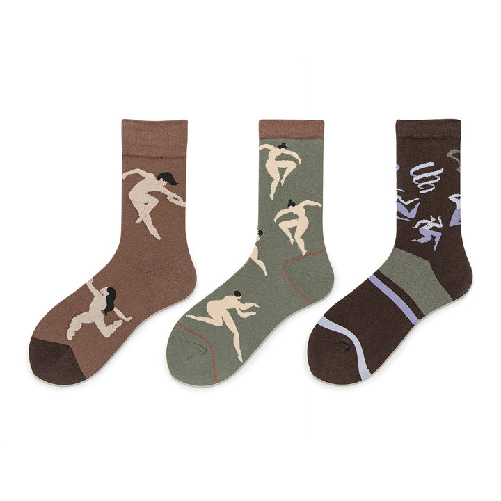 This set of novelty socks is available in three distinct designs, each featuring nude dancers reminiscent of Matisse's iconic masterpiece.