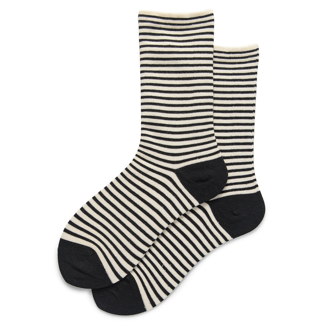 This pair has the most classic contrast: white socks adorned with bold black stripes, accompanied by black heel and toe sections.