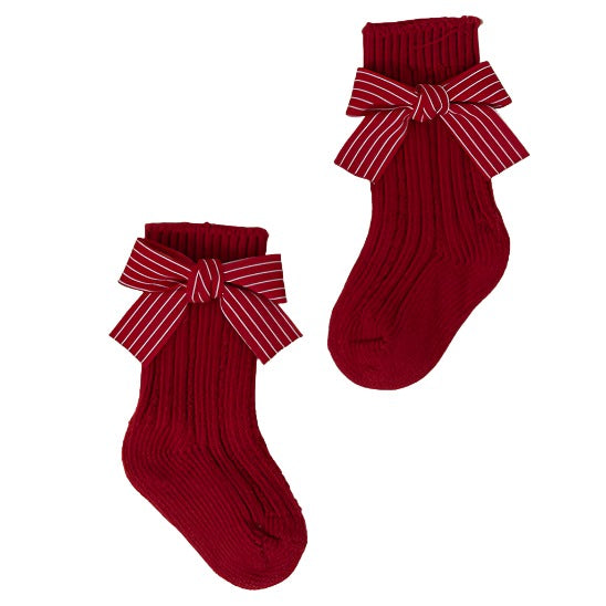 Pair this lovely pair of red socks with your girl's favorite holiday dress.