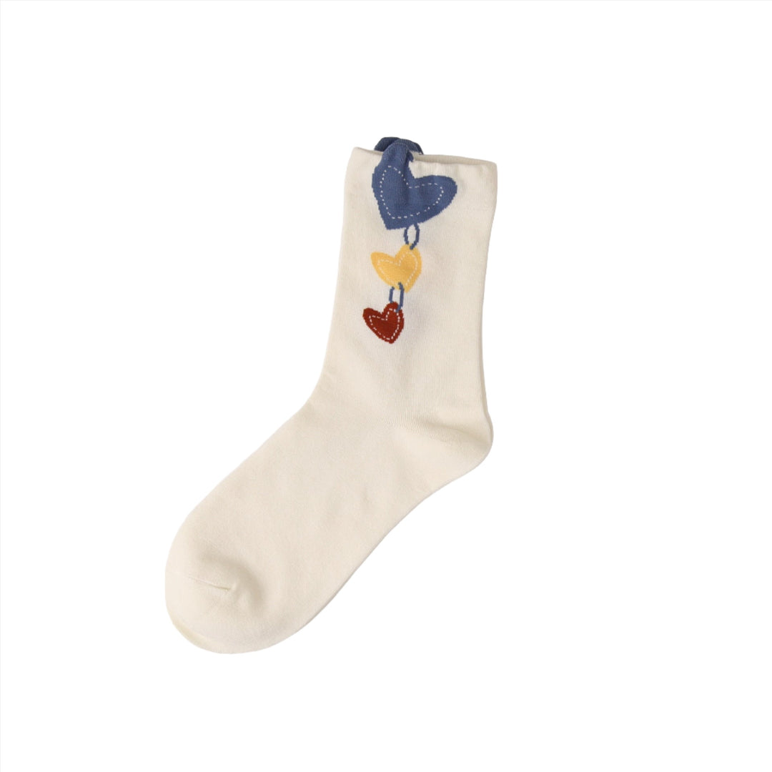 White socks with colorful hearts