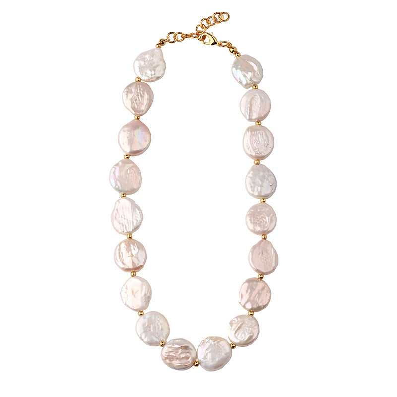 Each baroque coin pearl in the necklace is unique.