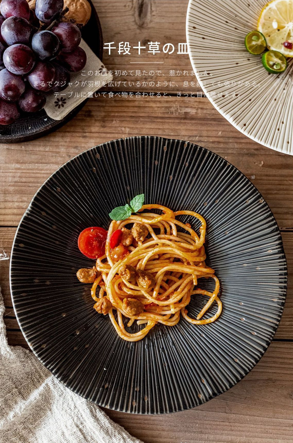 The black plate elegantly presenting a pasta dish, demonstrating its suitability for various cuisines and its ability to enhance food presentation.