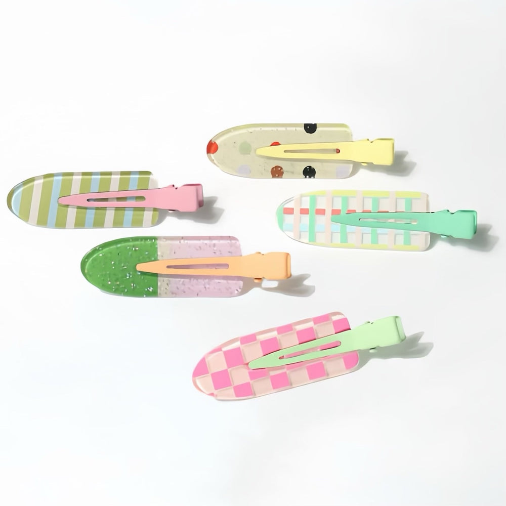 Made from durable resin and metal, these clips provide a secure hold and add a vibrant accent to any hairstyle.