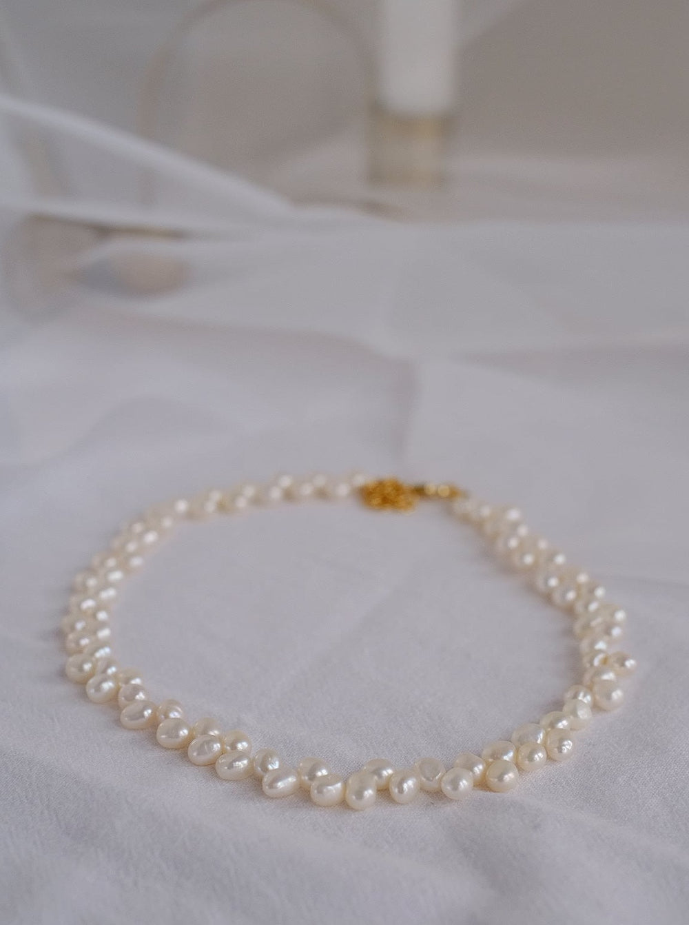 Close-up image showcasing the intricate details of the freshwater pearls