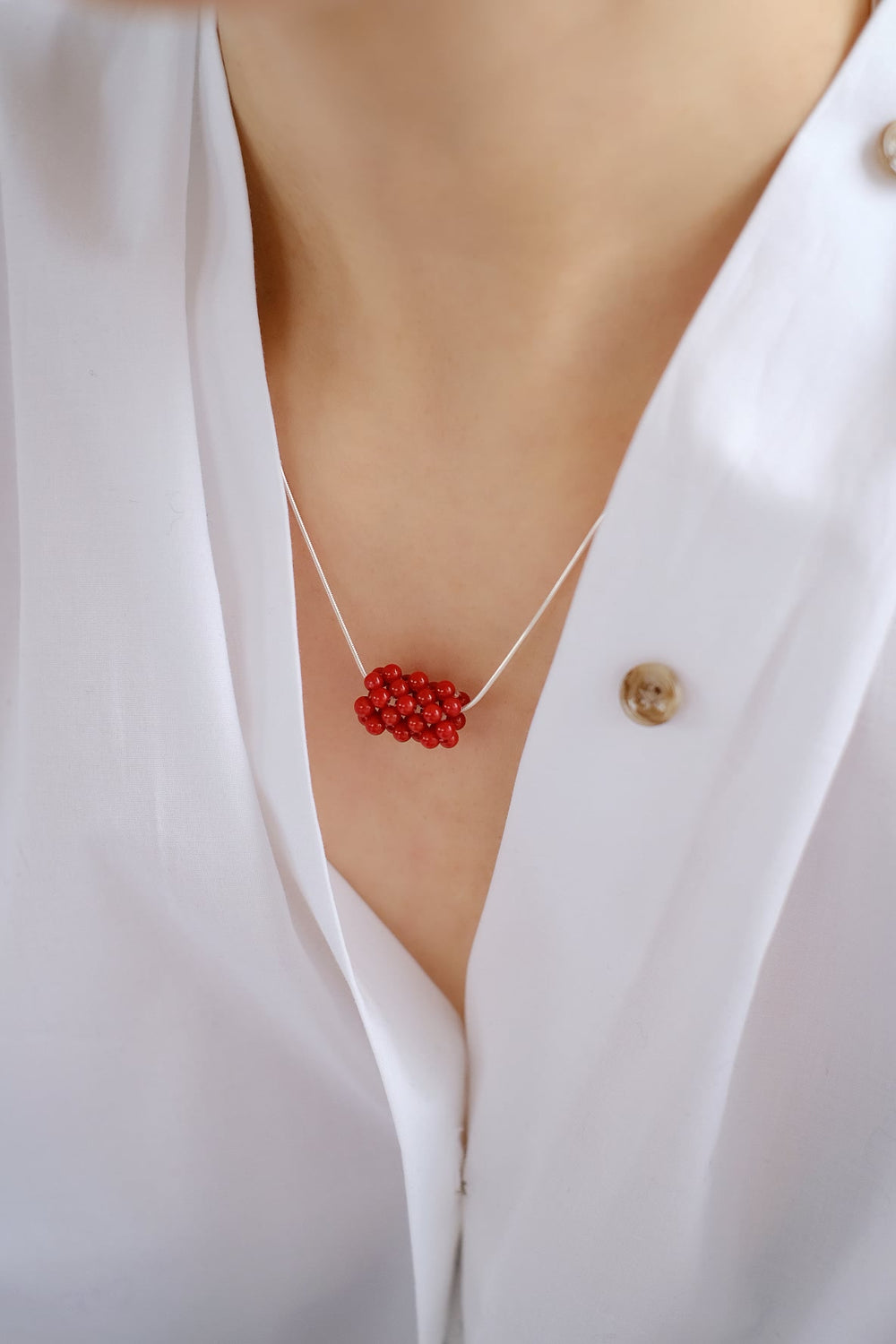 The Sweet Raspberry necklace is light enough for daily wear yet impactful enough to make a statement.