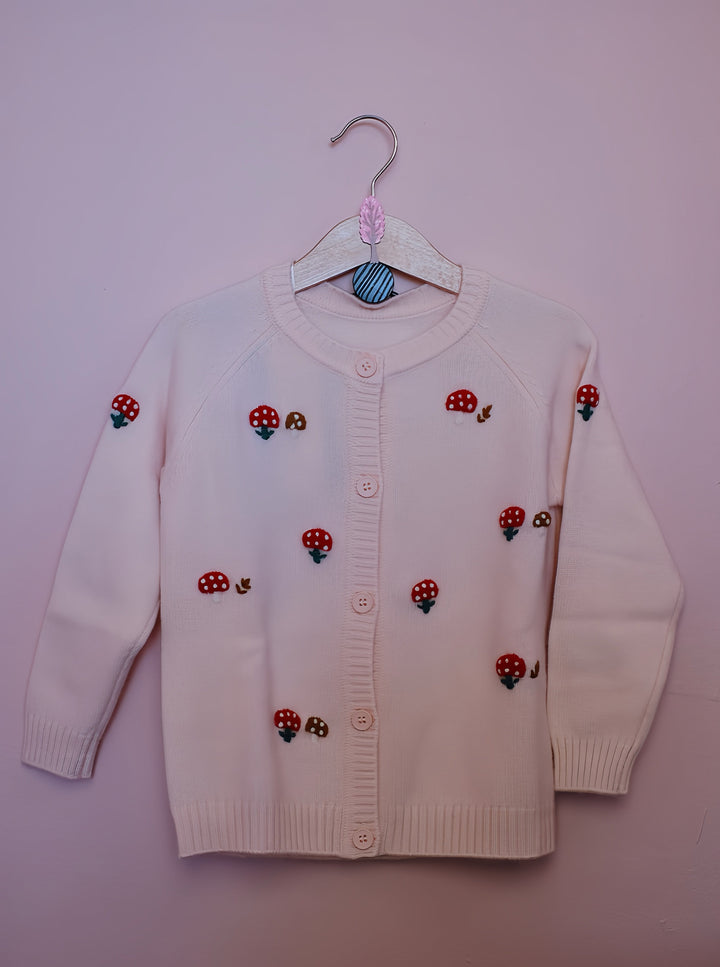 The light pink yarn of this sweater adds a touch of sweetness, perfect for girls.