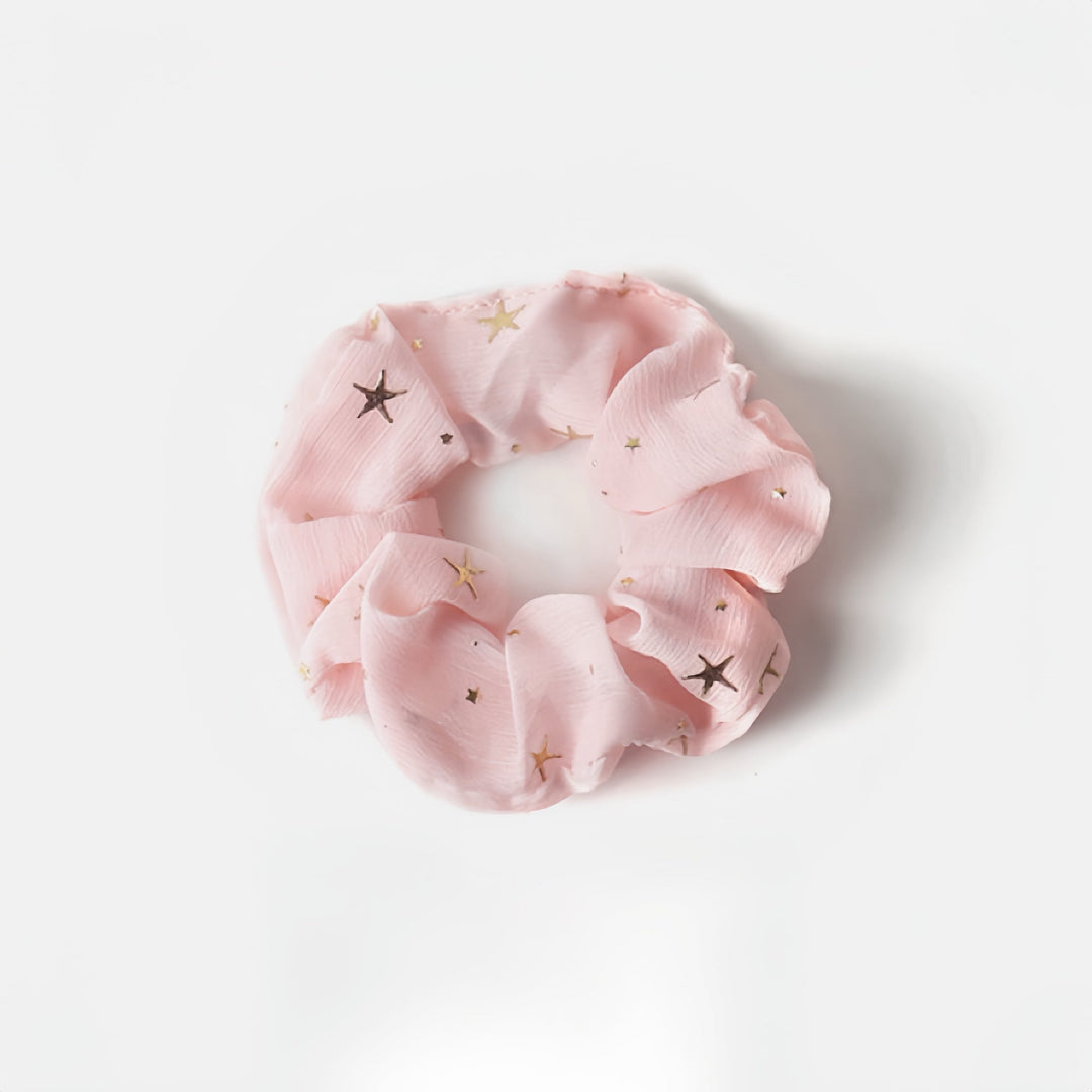 Style your spring look with this pink hair scrunchie, a romantic favorite among girls.