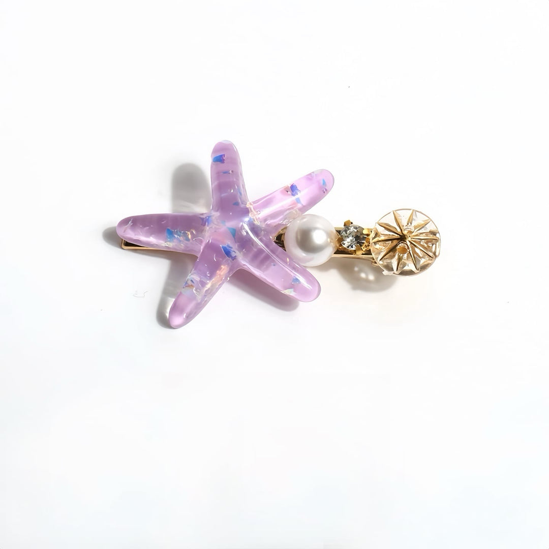 Close-up of the purple starfish hair clip to highlight its detailed design and sparkling finish.