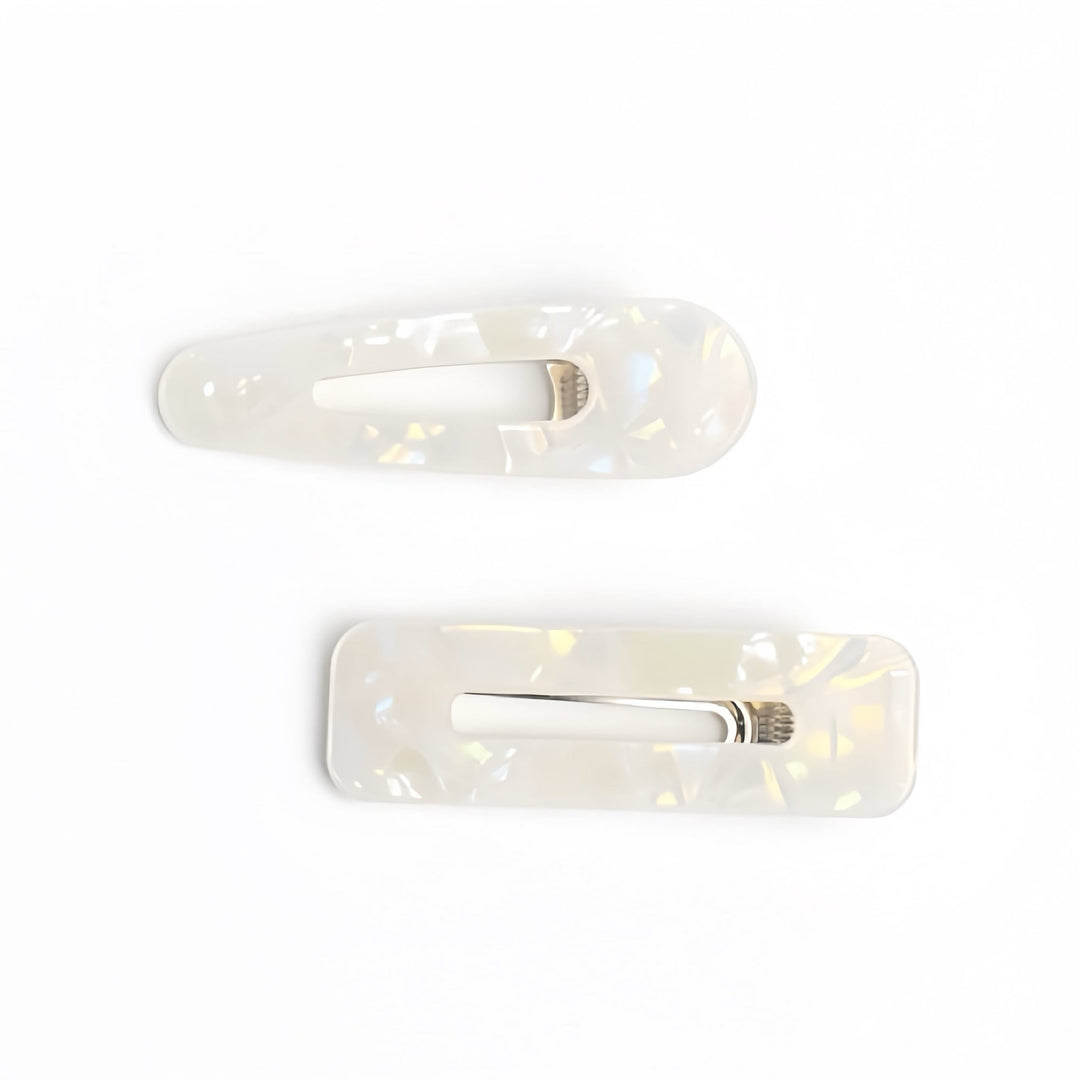 Achieve an elegant look with our mother of pearl white hair clip set.