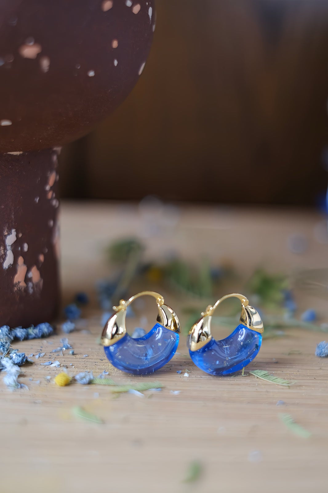 These earrings will add a touch of bright summer hues to your outfit.