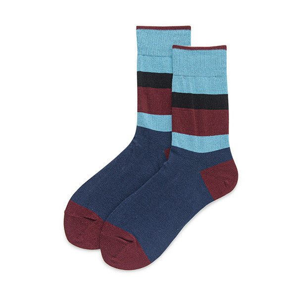 The full pair of socks laid out flat, showcasing the sleek and modern striped pattern in rich and contrasting colors.