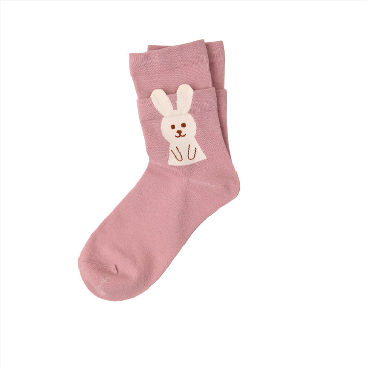 The pink novelty sock, with its adorable white bunny and 3D ears, brings a playful twist to women's and girls' socks collections.