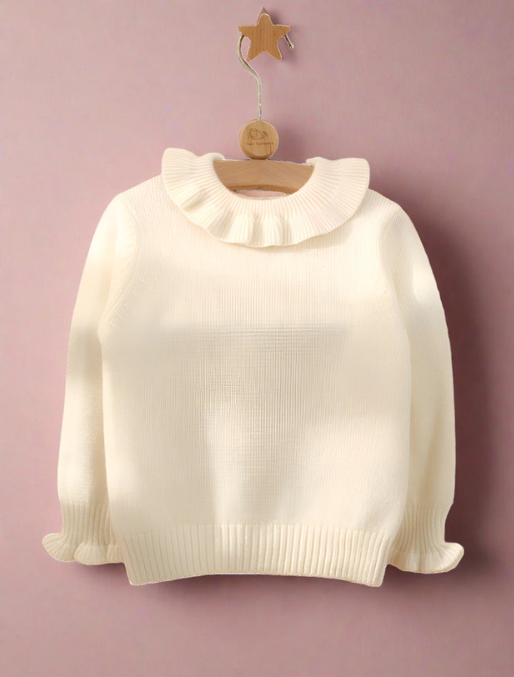 A white cashmere sweater is a perfect inner layer.