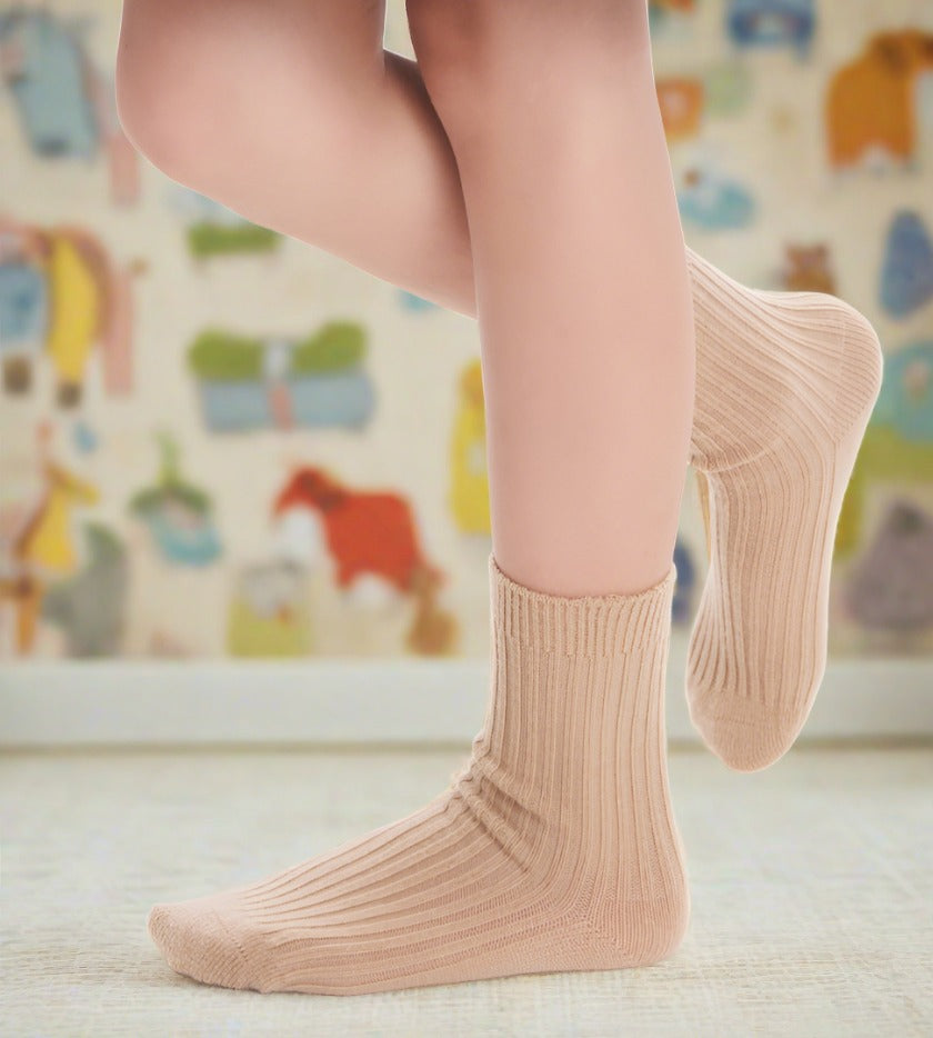 Keep your little one's feet warm and toasty at home with those wool socks.