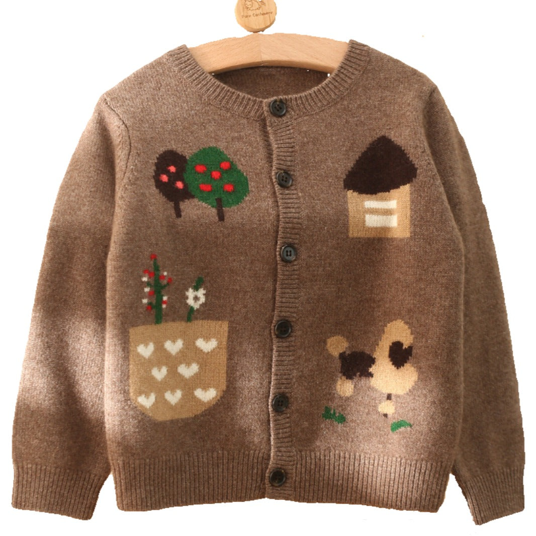 The brown cashmere and wool cardigan for boys is decorated with trees, a playful dog, and a quaint flower garden.