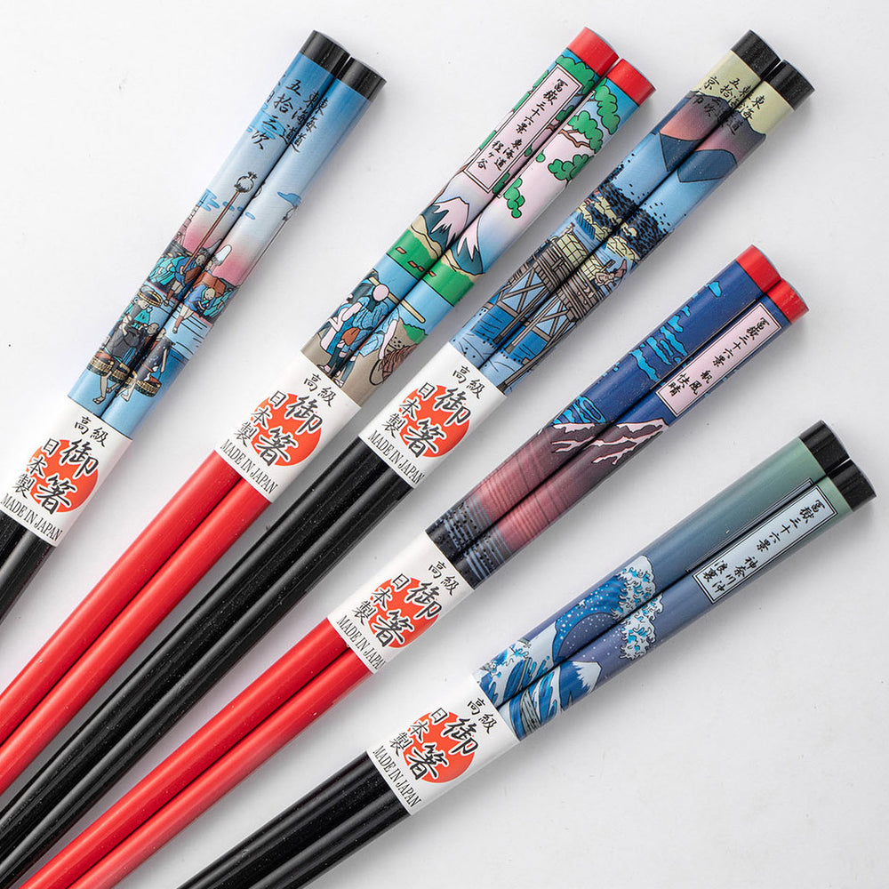 Close-up of the Mt. Fuji design on the chopsticks, showing intricate details and vibrant colors.