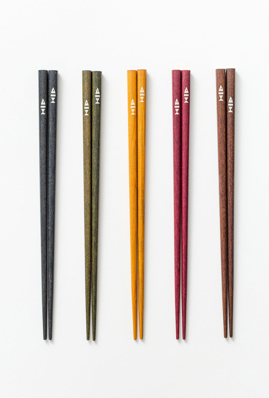 A set of 5 pairs of handcrafted Japanese wood chopsticks arranged in a row.