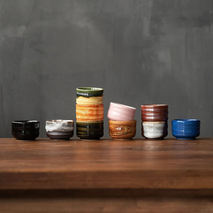 The distinctive designs and elegant craftsmanship of each handmade cup are displayed, reflecting the beauty of Japanese ceramics and homeware.