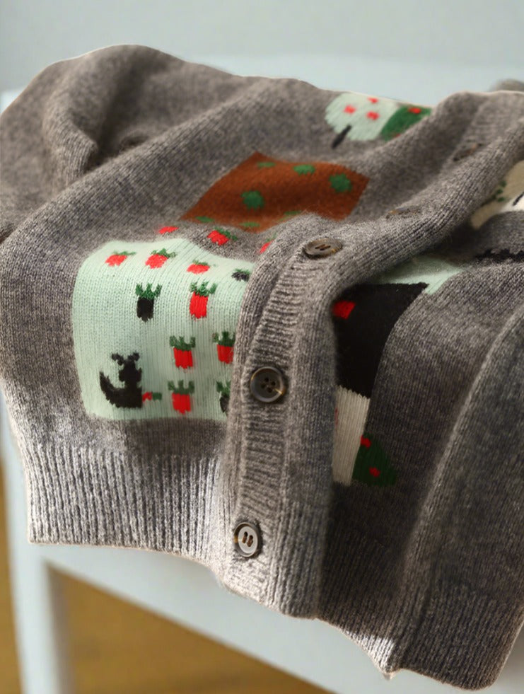 Admire the rich hues and superior quality of this children's cashmere cardigan in this detailed shot, perfect for adding warmth and style to any ensemble.