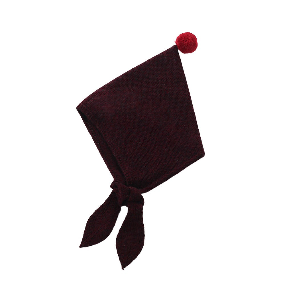 This dark wine colored cashmere and wool hat is perfect for keeping kids cozy during the Icelandic fall season.