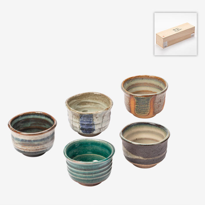 Each of the 5 cups in this Japanese ceramic tea cup set is adorned with intricate designs, reflecting the essence of wabi-sabi and celebrating the beauty of imperfection.