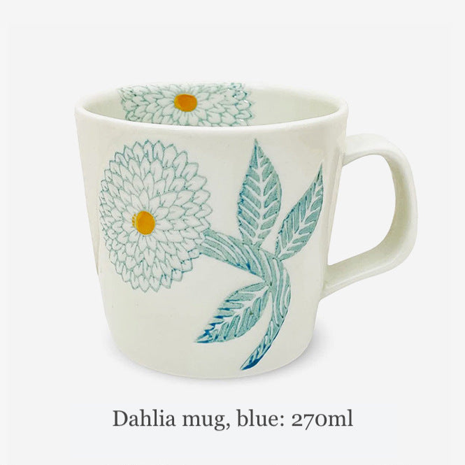 Sip your favorite coffee with this blue dahlia mug!