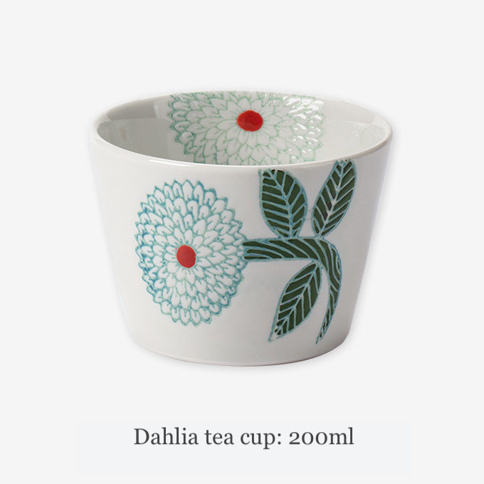 The green Dahlia tea cup is perfect for savoring your favorite brew.