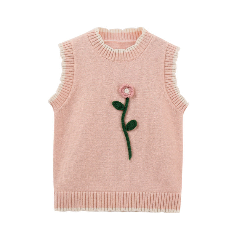 Experience ultimate comfort and warmth with this children's pink cashmere vest in flower design.