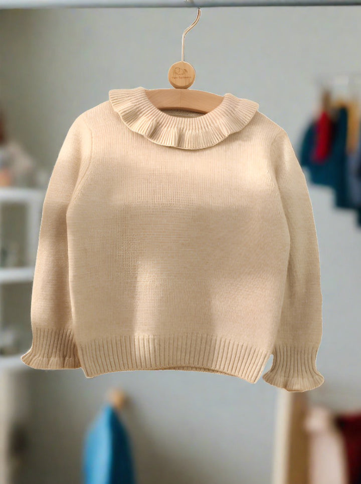 The beige color showcases the raw and organic color of cashmere.