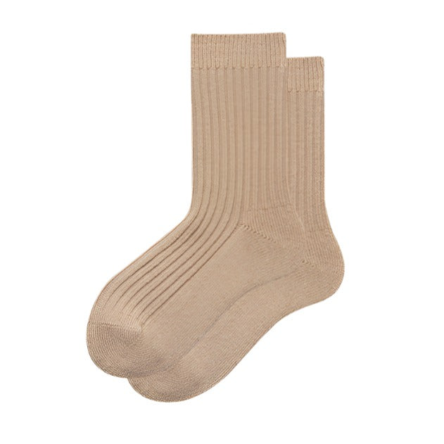 These neutral and earthy oat wool blend socks are perfect for pairing with a variety of outfits for both boys and girls.