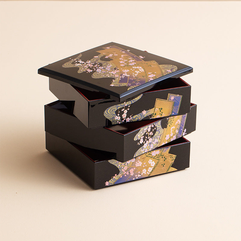 This image features the jewelry box with its compartments and trays separated, showcasing the organizational possibilities. Each section is carefully designed to house different types of jewelry, providing a clear view of how the box can keep your accessories neatly sorted and easily accessible.