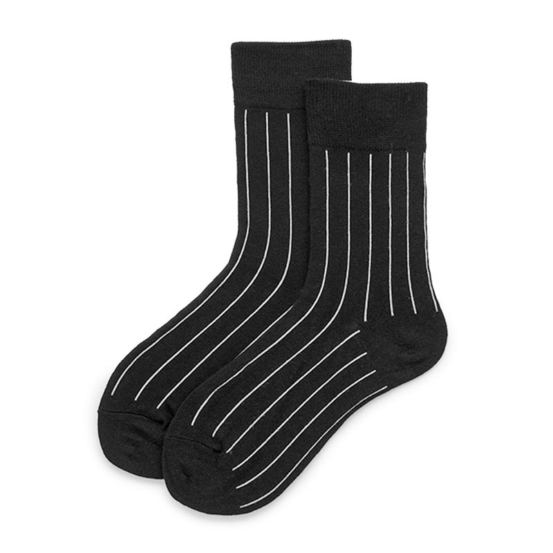 These men's socks in black with white stripes add a stylish twist to classic business attire. 