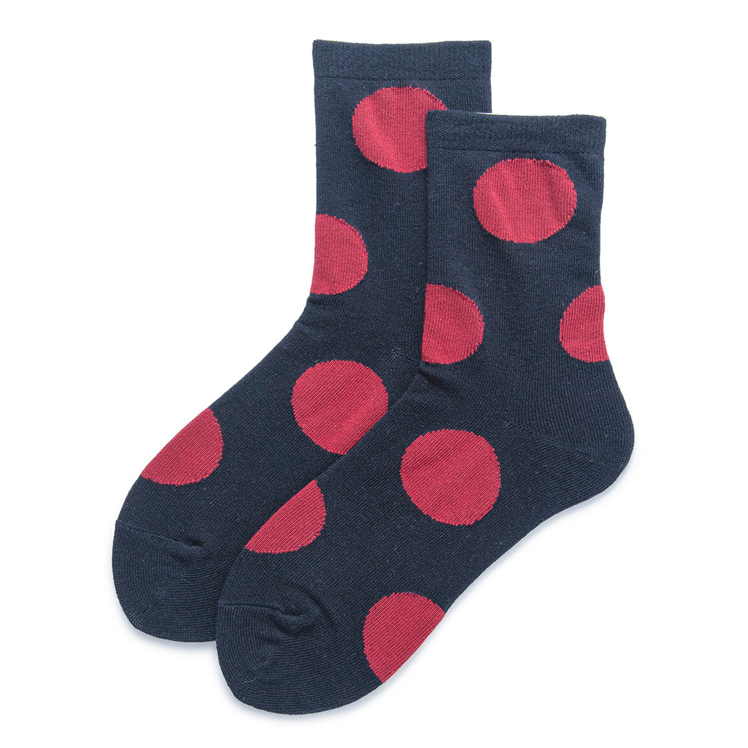 Add a splash of color to your everyday black cotton socks with these ones featuring large red polka dots.